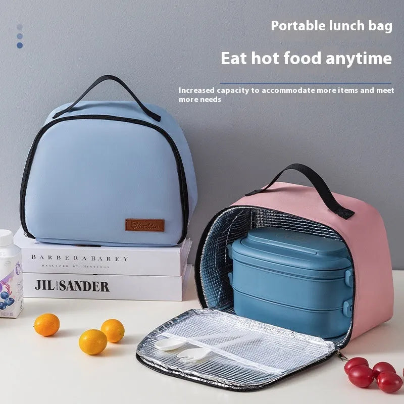 Insulated large capacity bento handbag in textured cloth, shown in purple colour.