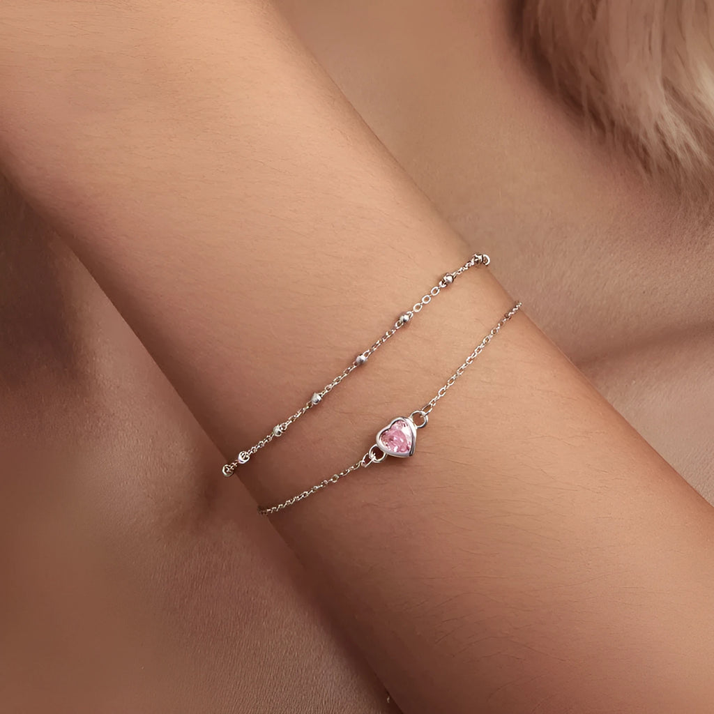 Women's 925 sterling silver bracelet with heart-shaped pendant on adjustable chain