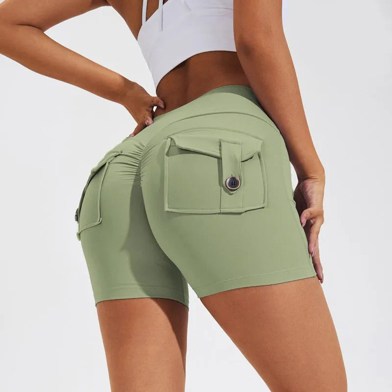 Women's high-waist fitness shorts in quick-dry nylon with side pockets, shown in Electric Blue.