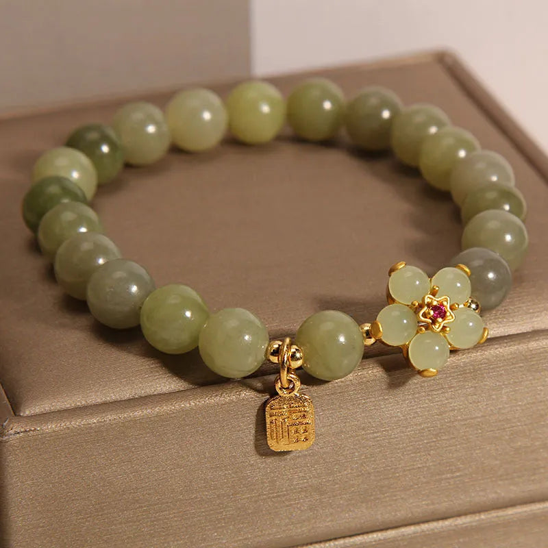 Women's alloy bracelet jewellery with grey jade colour stone detail in casual style