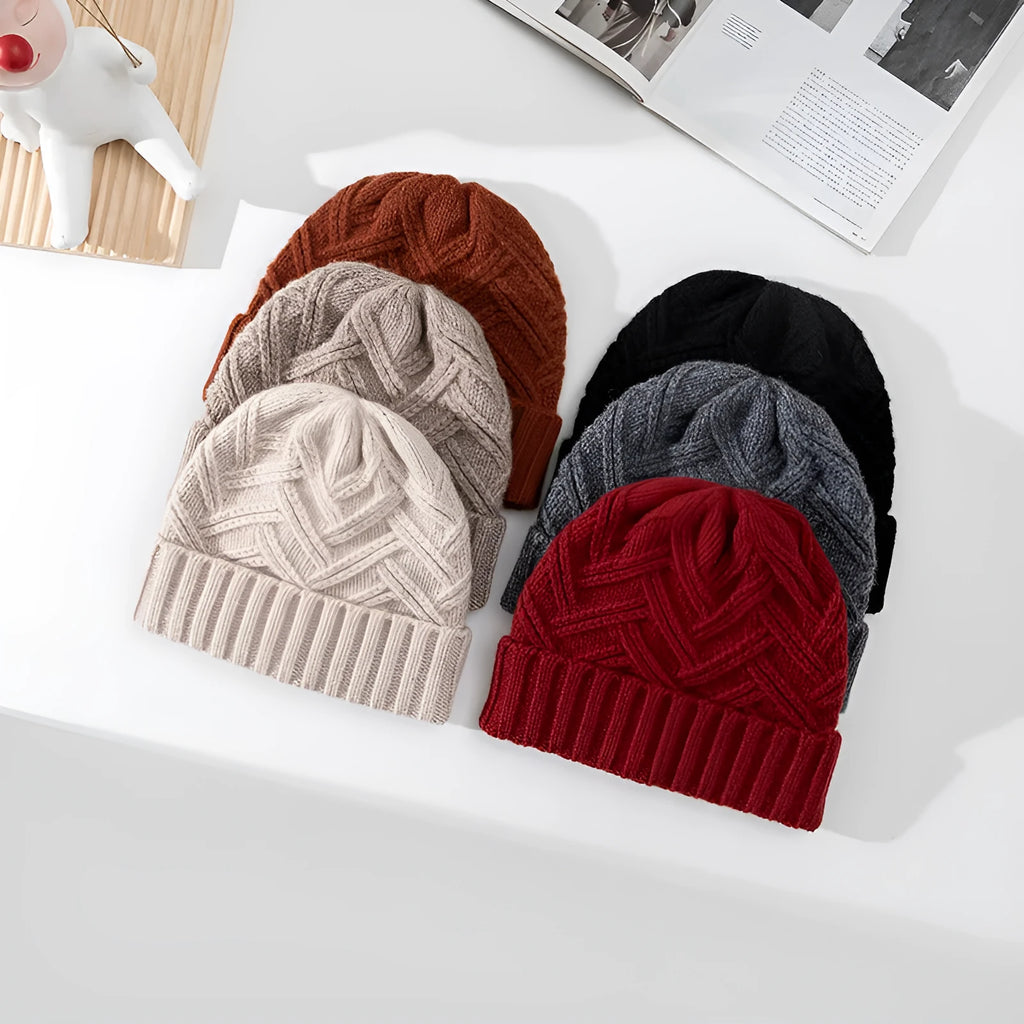 Wool knitted dome crown beanie in six colour options with totem pattern detail