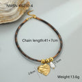 Leopard print geometric pendant on stainless steel necklace with gold-plated accents