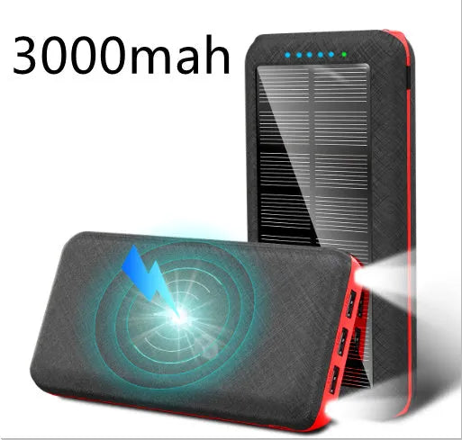 Black solar power bank with wireless charging pad, three USB ports, and an LED flashlight.