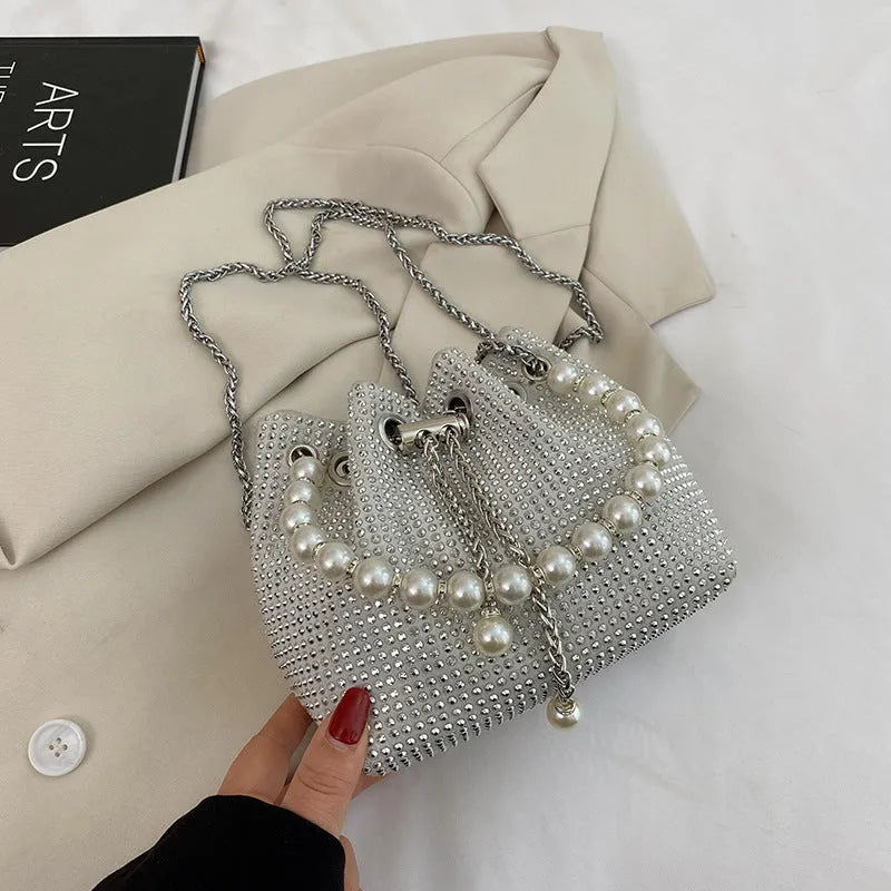 Western style diamond crossbody bag with chain strap in bucket shape design