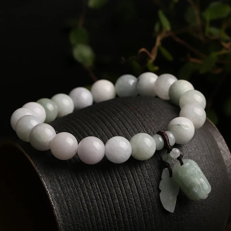 Natural emerald jade bracelet with geometric beads and Maitreya Buddha hanging pendant