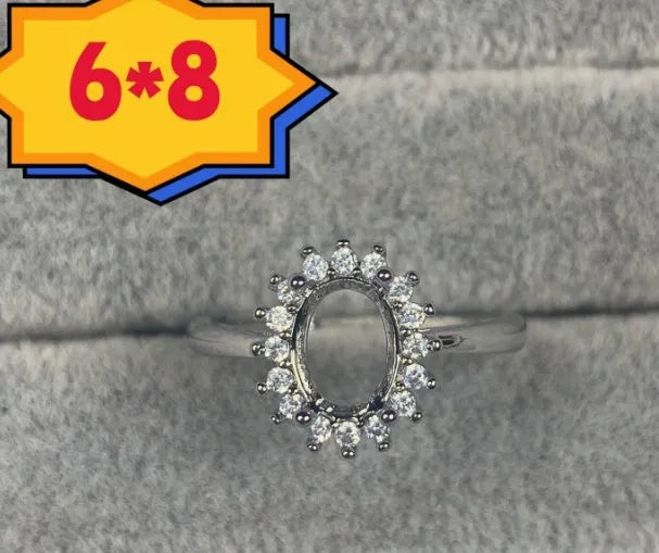 Oval denier ring with open mouth design, five-pointed star ornament, and 6*8mm stone