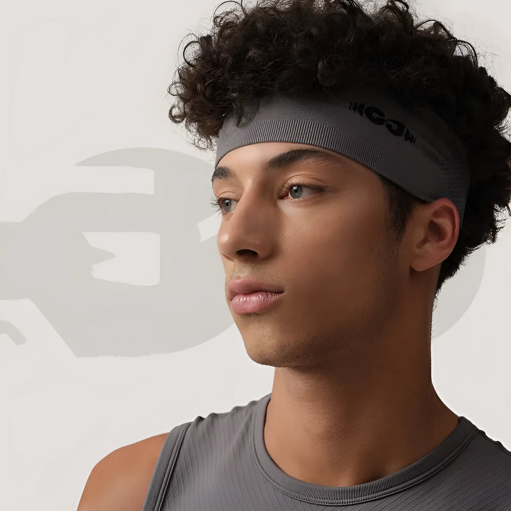 Seamless knitted sports hair band in black, grey, or blue for running and cycling.