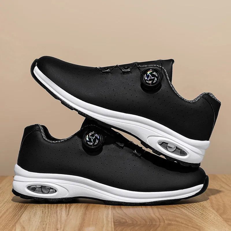 Women's black mesh low-top casual trainers with white cross-straps and a round toe, on a white background.
