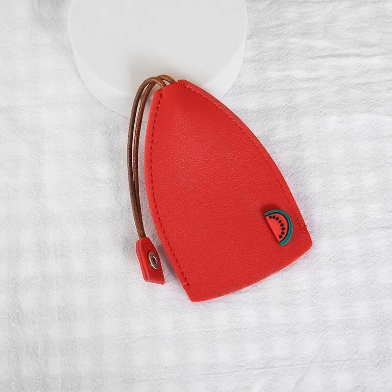 Cartoon PU leather pull-out car key case measuring 14 x 7.5cm with colourful designs