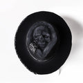 Handmade wool felt and denim Halloween skull hat with conical crown design