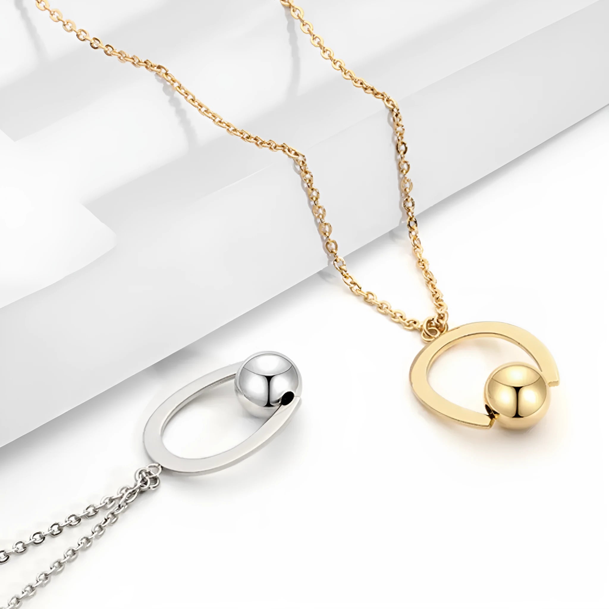 Stainless steel geometry pendant necklace with adjustable cross chain in gold or silver finish