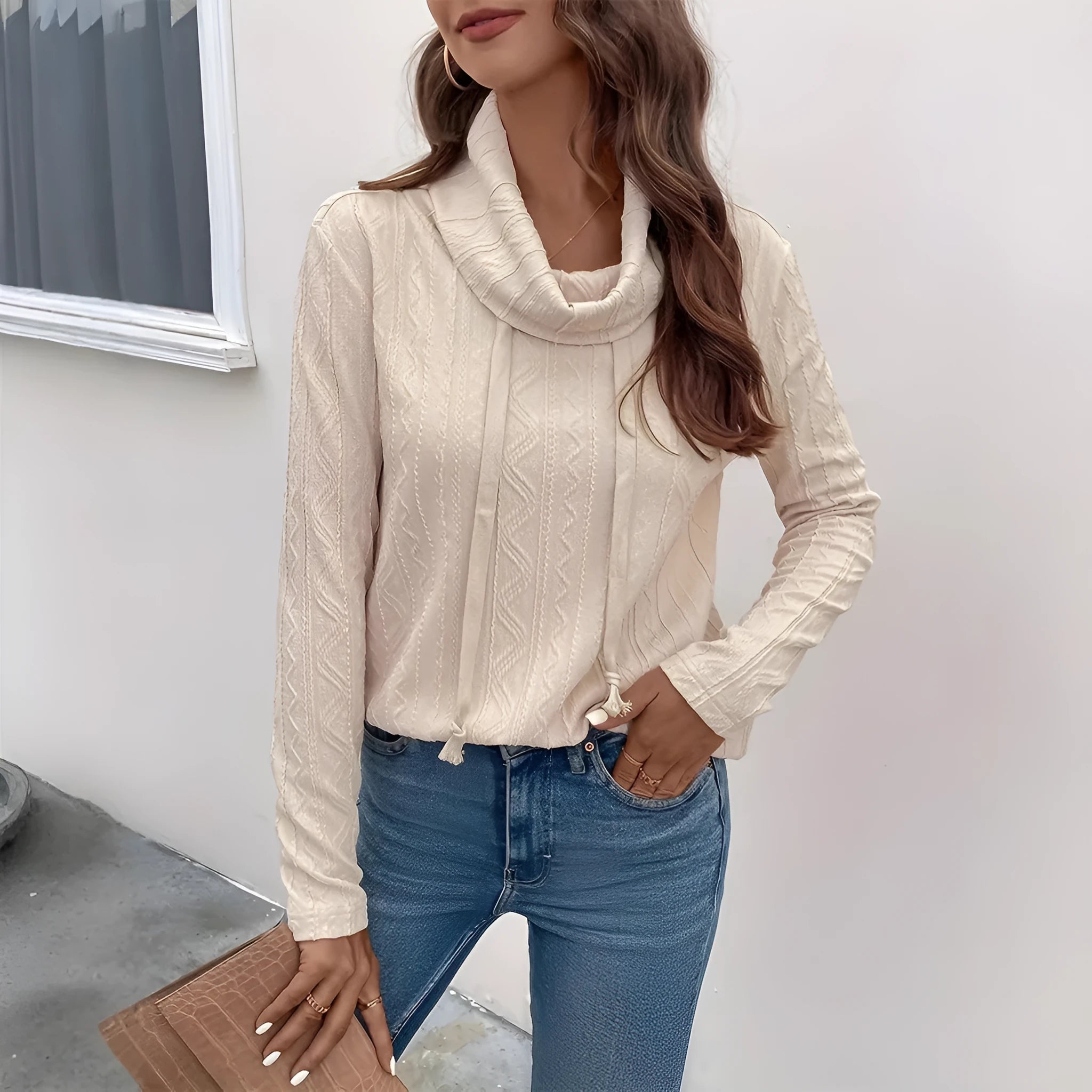 Apricot coloured long sleeve hooded pullover sweater with drawstring adjustment