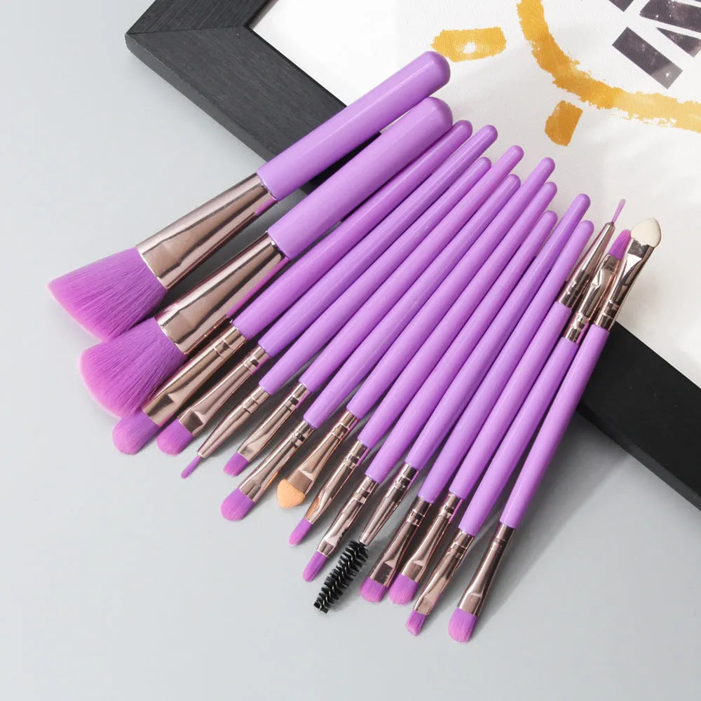 18-piece makeup brush set with a fan brush and assorted cosmetic brushes on a table.
