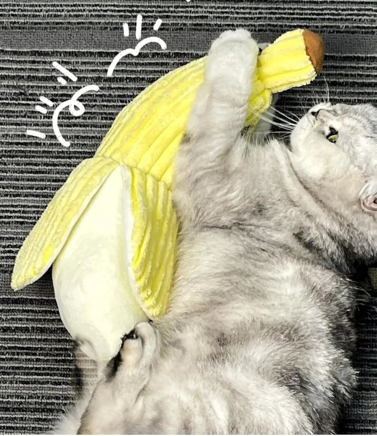 Yellow banana-shaped plush cat toy with crinkle paper and velvet texture strip