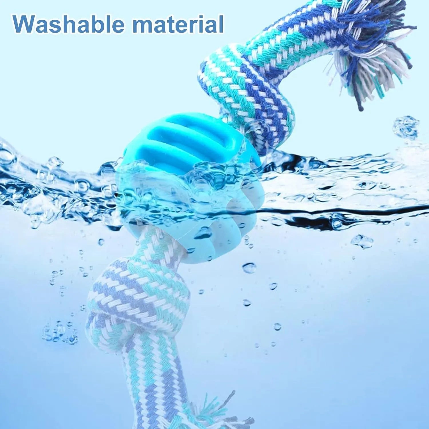 Blue soft dog chew toy with molar-shaped textured head and integrated knotted rope for dental care.
