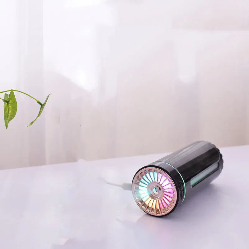 Black portable humidifier with LED lights showing dimensions and USB charging port