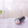 Black portable humidifier with LED lights showing dimensions and USB charging port