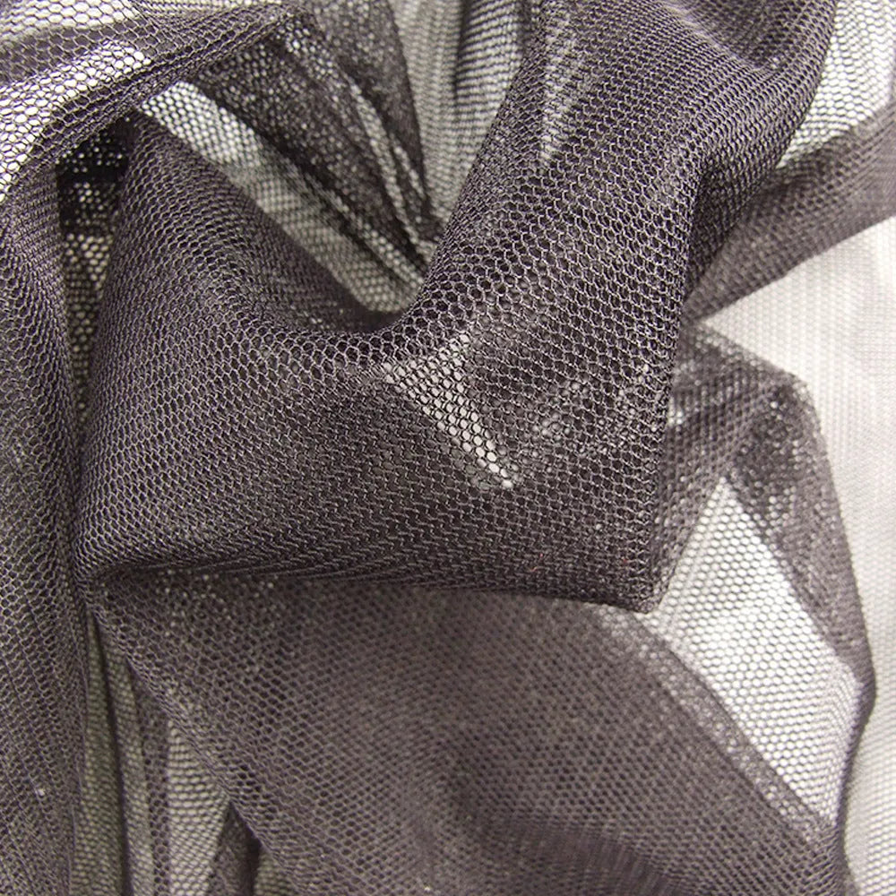 Mosquito protection suit set in mesh fabric, showing hooded top, pants, and booties for outdoor use.