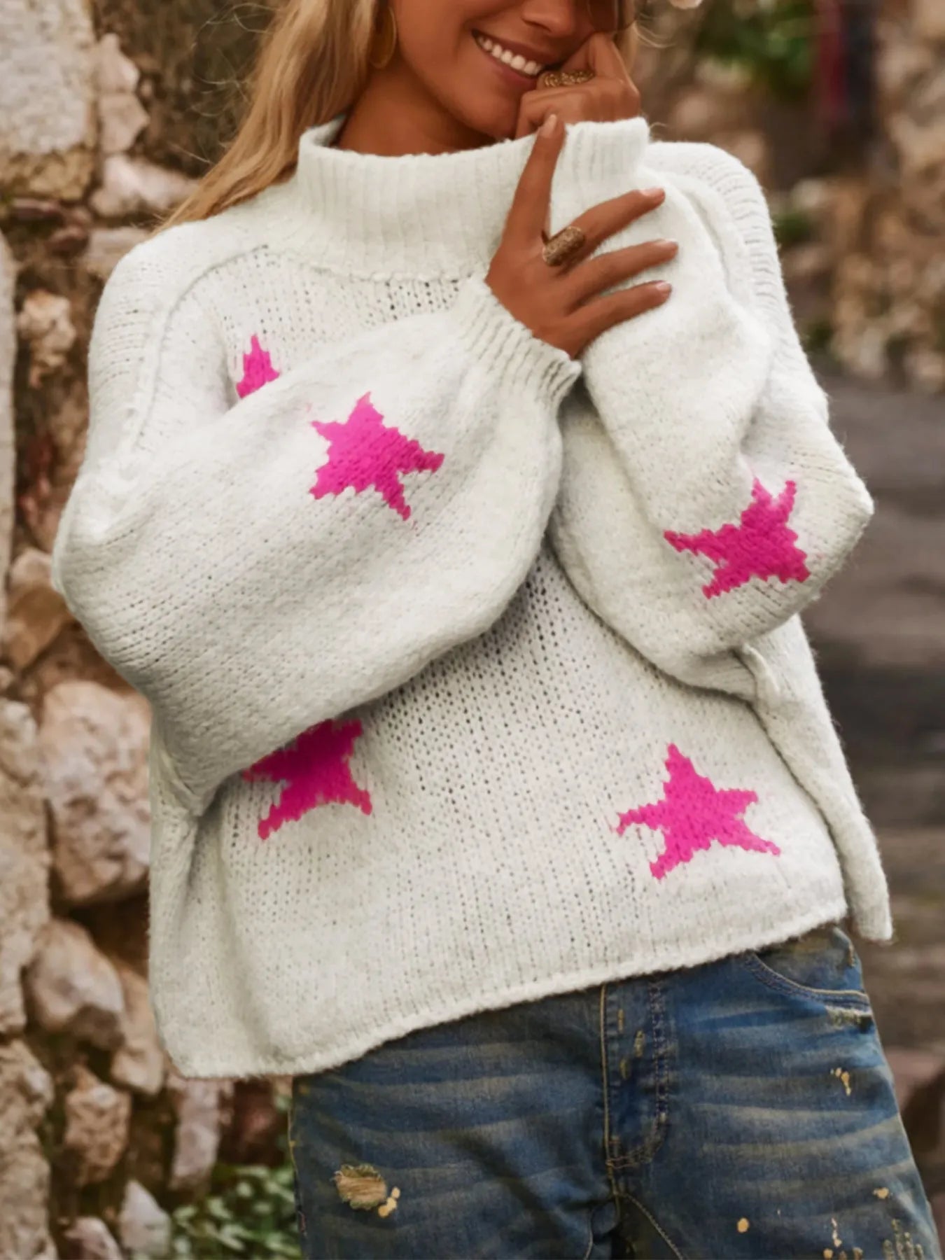 White women's turtleneck pullover with contrast star pattern on imitation velvet fabric