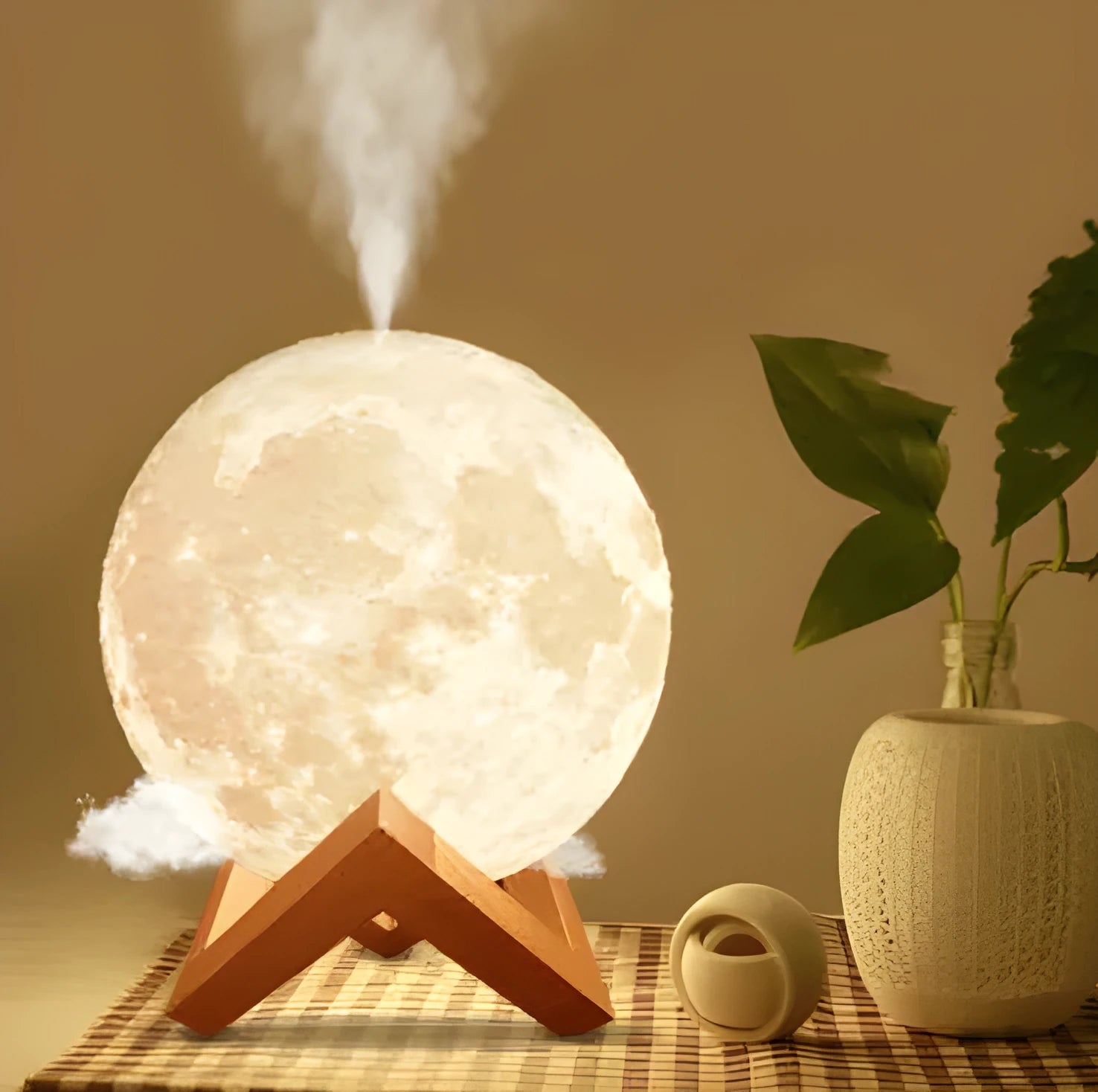 Lunar-shaped humidifier night light with 13cm diameter PVC ball, showing clean white LED illumination