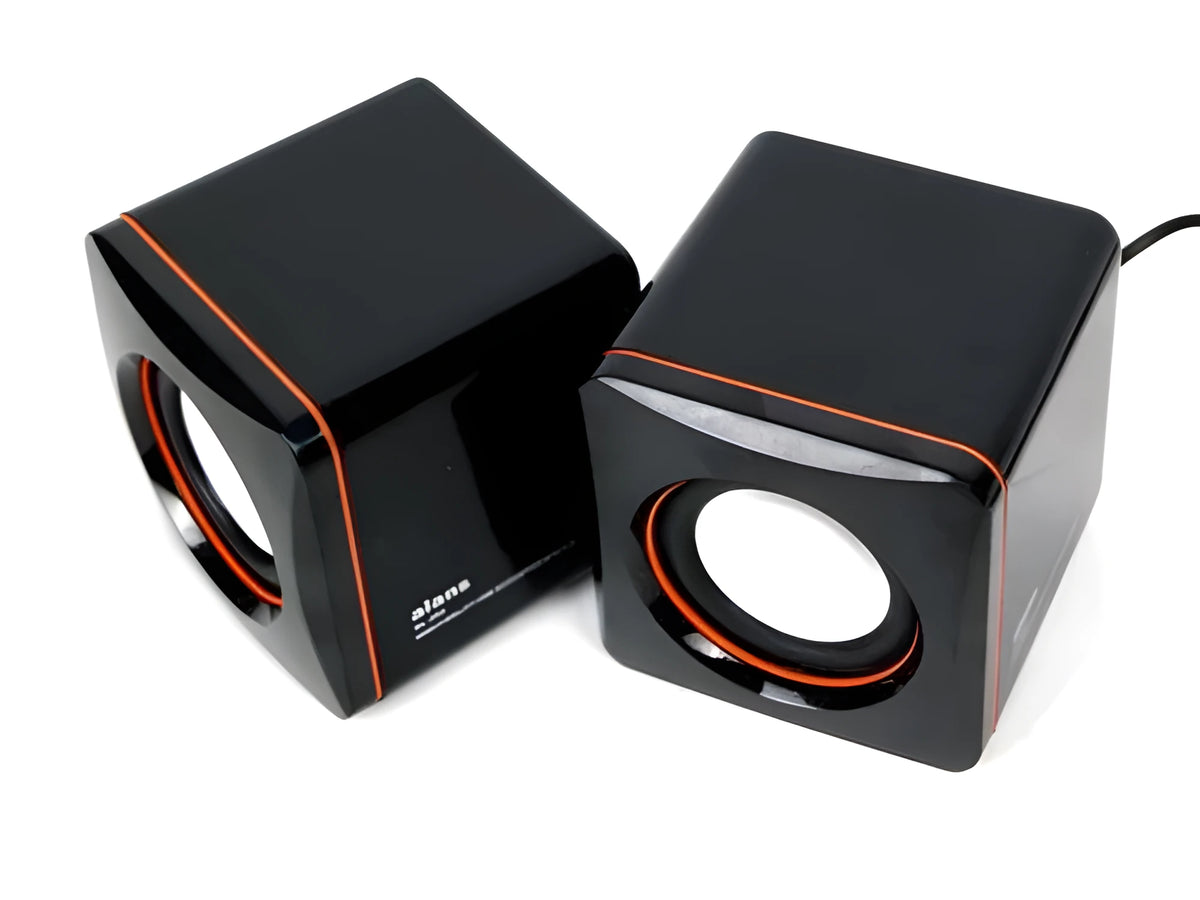 Black square USB-powered 2.0 computer speaker on desktop