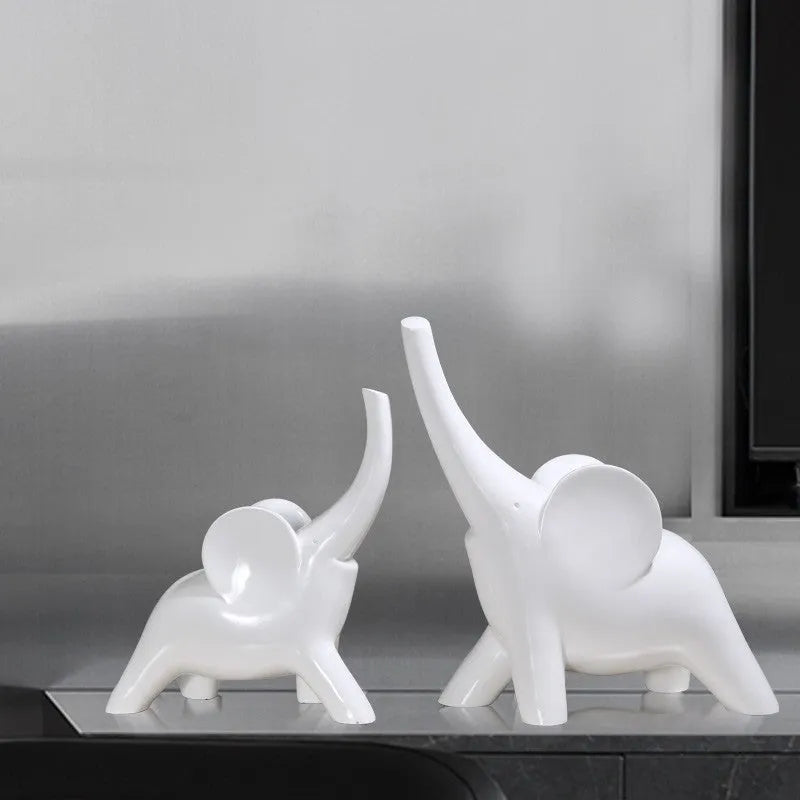 Modern resin fortune elephant ornament in rose gold or white colour, large and small sizes available.