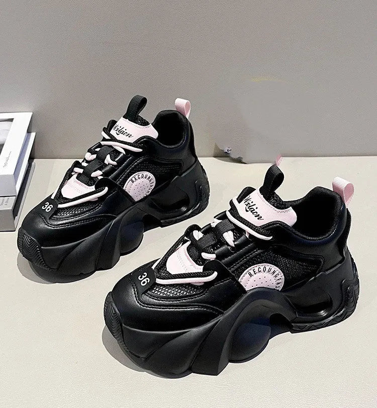 Women's pink casual sneakers with cross strap design and thick mid-heel sole