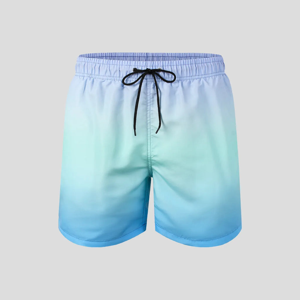 Men's grey gradient 3D printed mesh sports shorts on a white background.