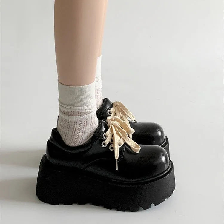 Black women's lace-up shoes with English muffin heels and round toe