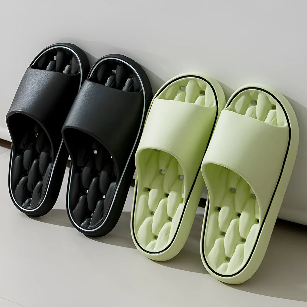 Non-slip EVA bathroom slippers with thick sole and hollow upper, available in seven colours and five sizes.
