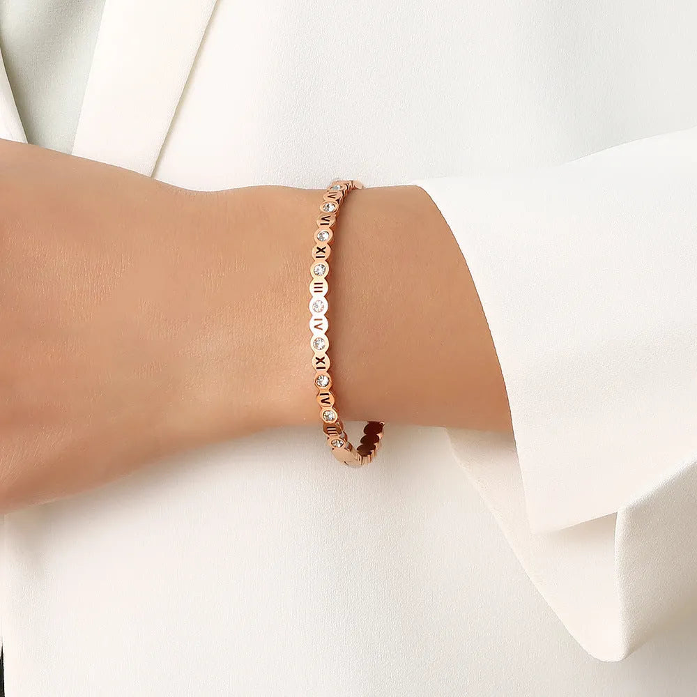 Korean style titanium steel bracelet with number elements in gold, rose gold, or steel colour options