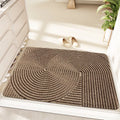 Green alien-shaped floor mat with cartoon pattern, measuring 60 by 90 cm with a wire ring border.