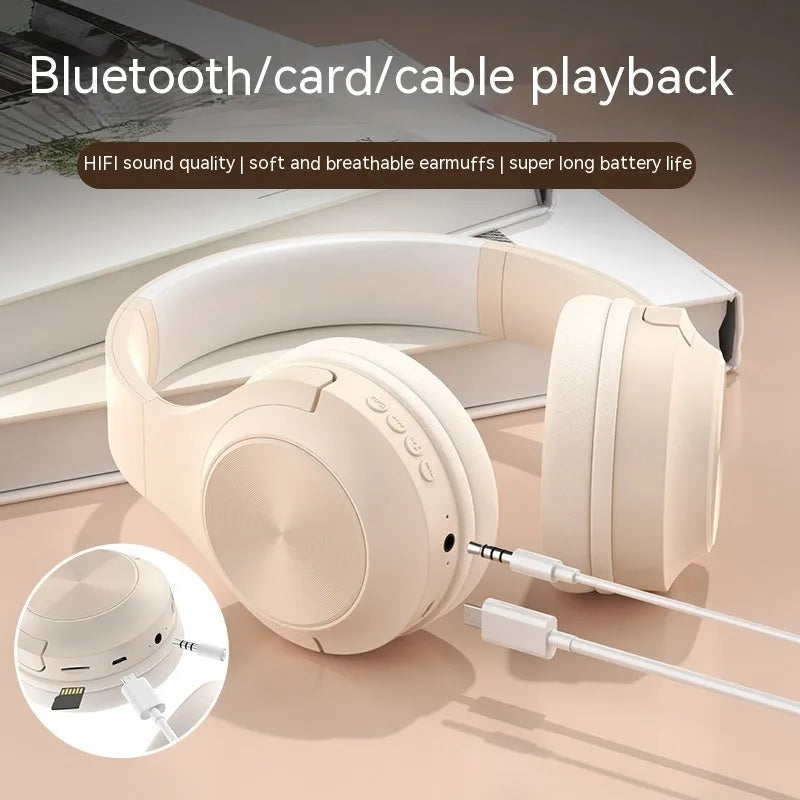 Wireless Bluetooth headset in ivory white, chalk black, or youth green colours showing head-mounted design and plastic construction