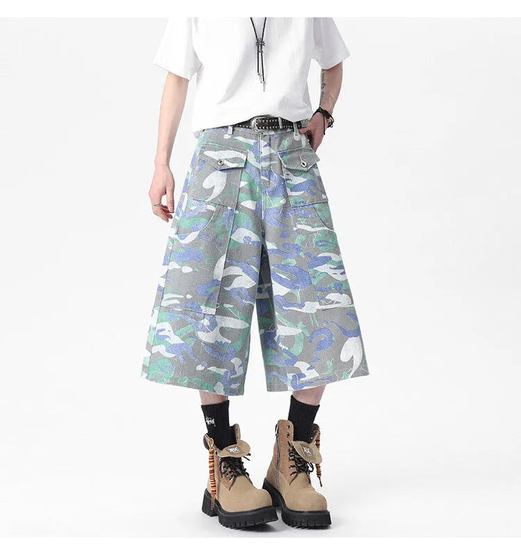 Denim camouflage cropped workwear trousers with straight leg cut and zipper fly closure
