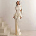 Women's slim fit long sleeve dress with high collar and pleated backless detail.