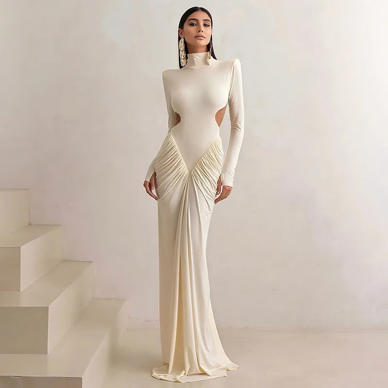 Women's slim fit long sleeve dress with high collar and pleated backless detail.