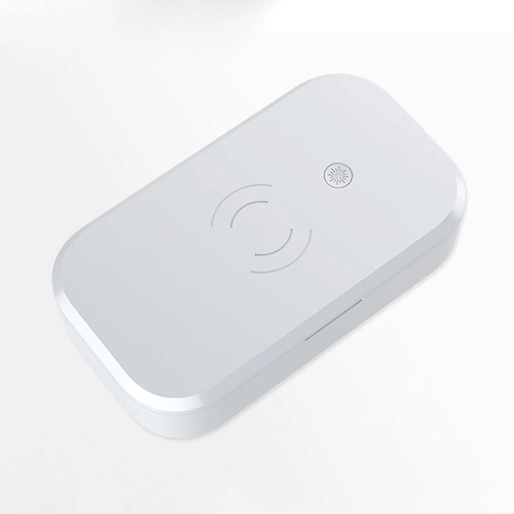 Portable ultraviolet disinfection box with wireless charging pad for nail tools and mobile phones