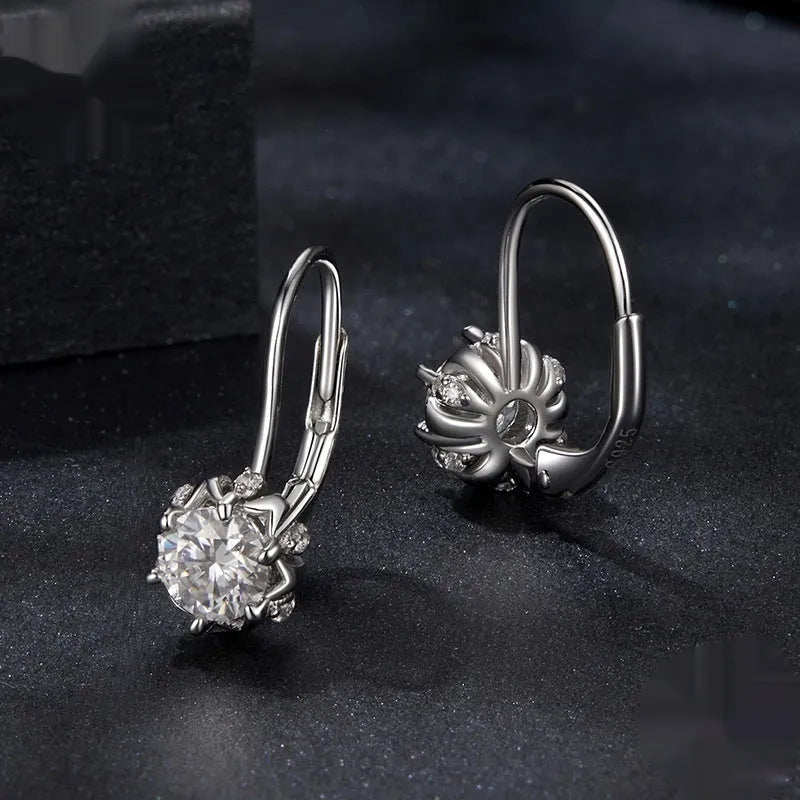 Flower bud design clip earrings in sterling silver with moissanite stone and white gold plating