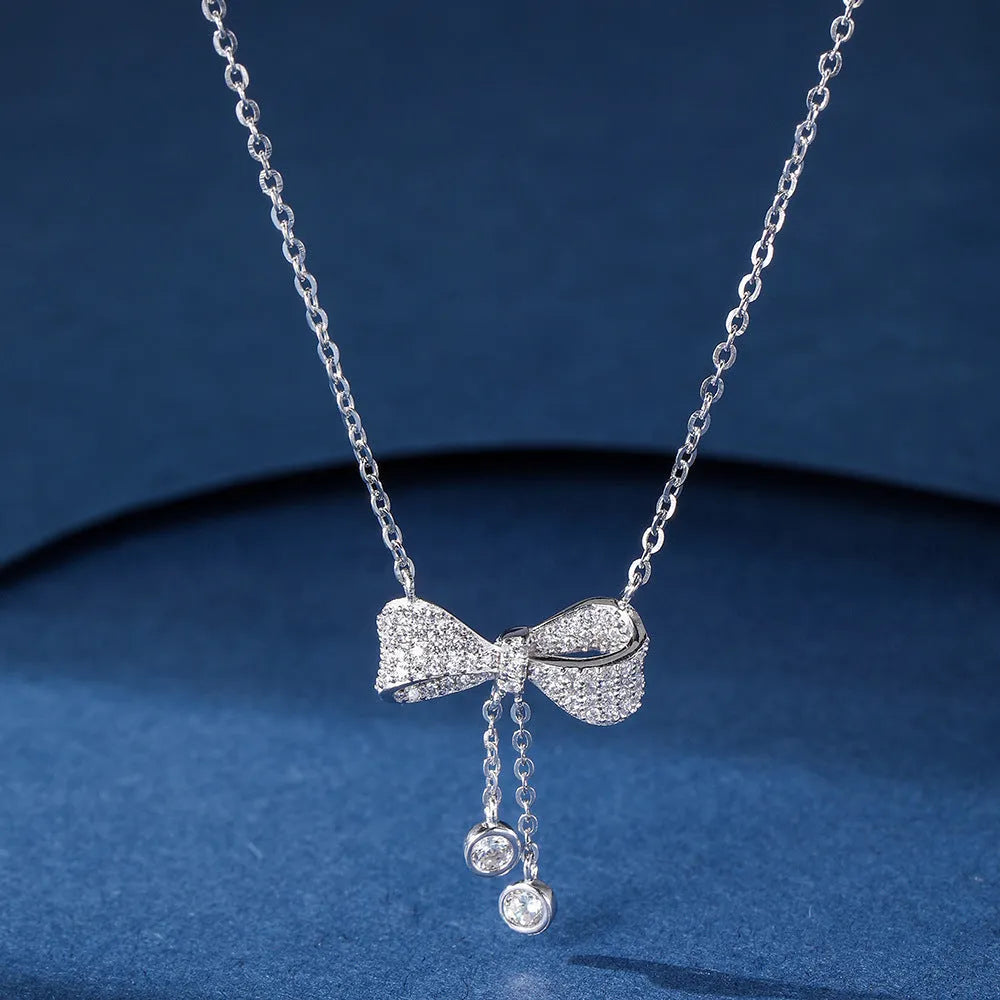 S925 sterling silver necklace with bow pendant on adjustable 40-45cm O-ring chain