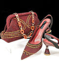 Women's pointed toe high heels with wine glass heel and matching small bag in blue colour.