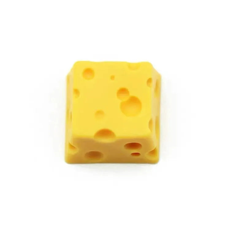 Resin cheese key cap for mechanical keyboards with yellow decorative cheese wedge design