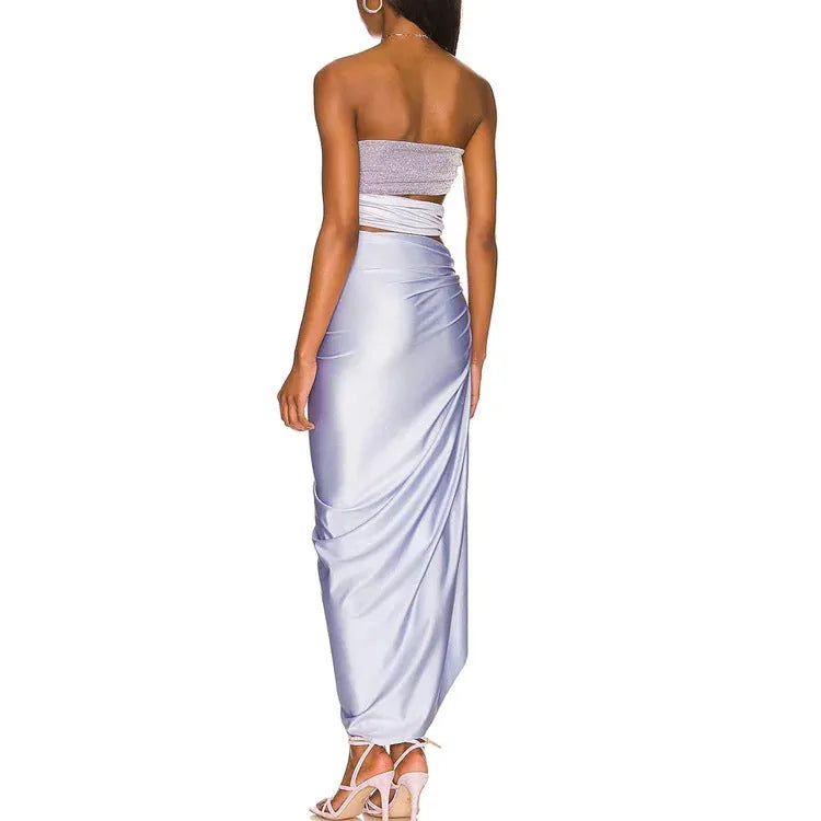 Purple hollow polyester swimsuit and matching wrap skirt set on mannequin