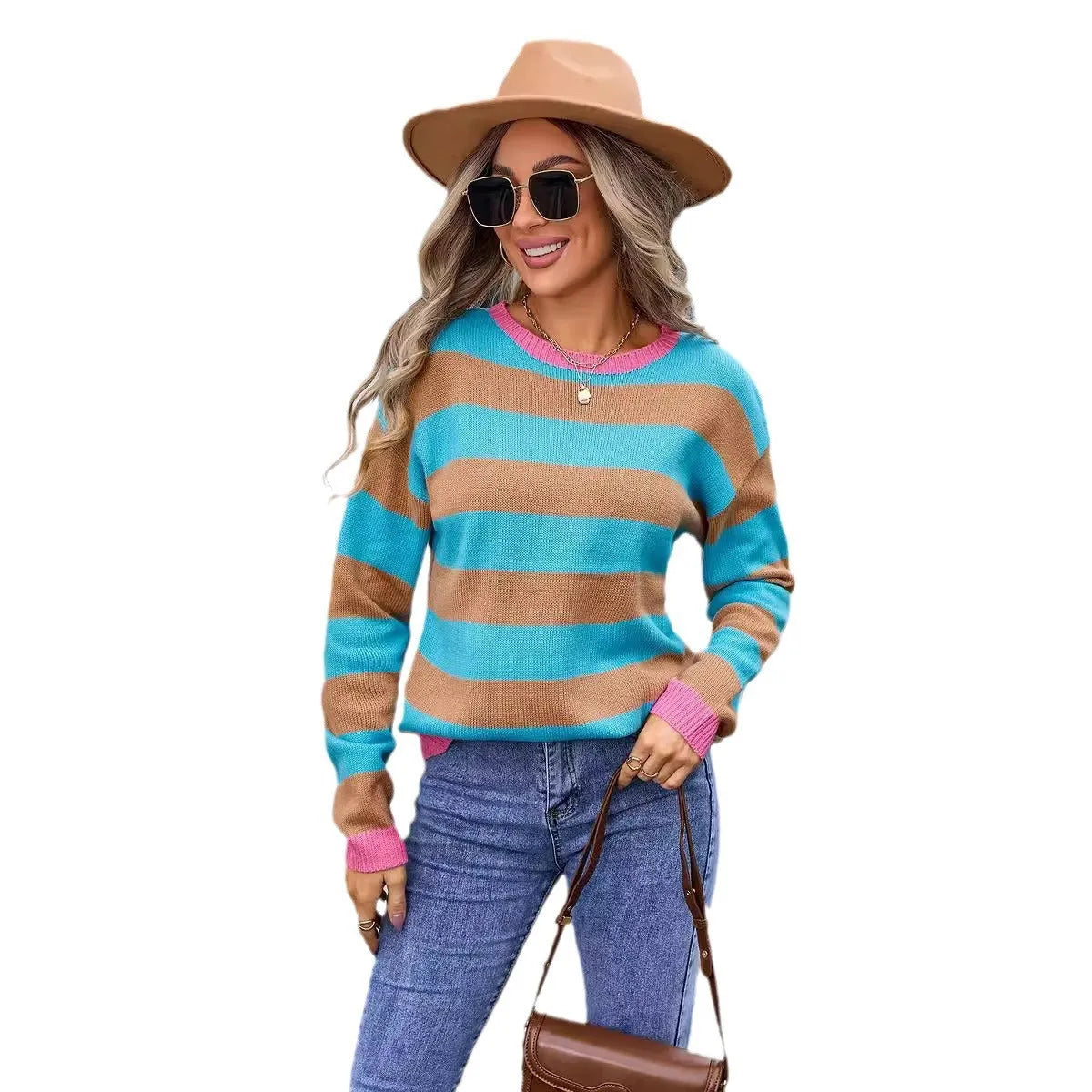 Women's loose long sleeve sweater in a striped pattern, shown in a blue colour option.