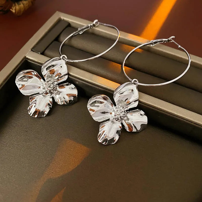 Silver needle metal flower earrings with geometric design in gold or silver electroplated finish