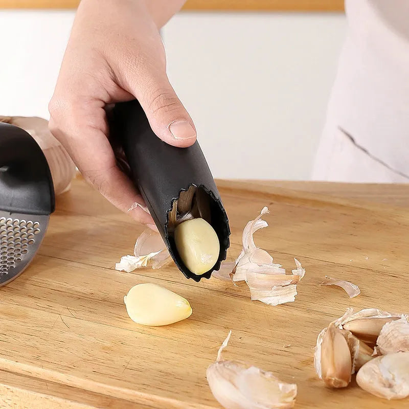 Stainless steel garlic press with modern design in choice of four colours for kitchen use