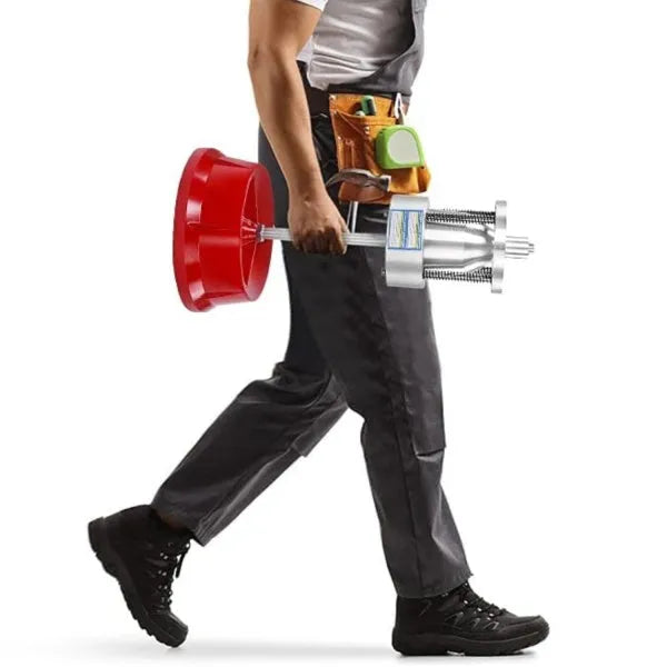 Portable hub balancer tool with aluminium head and enamel-finished base for wheel balancing.