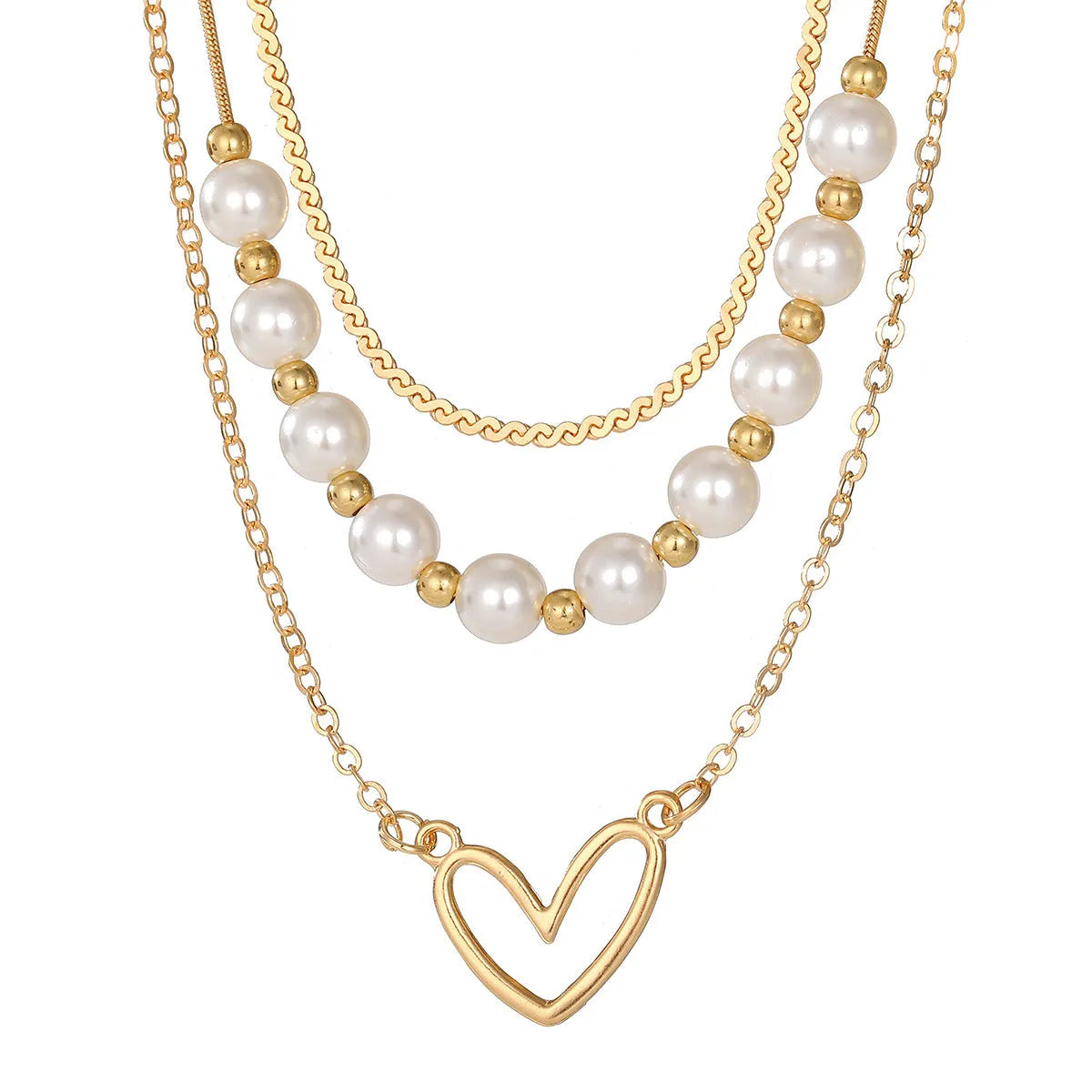 Vintage gold necklace with double heart pendant on textured pearl chain