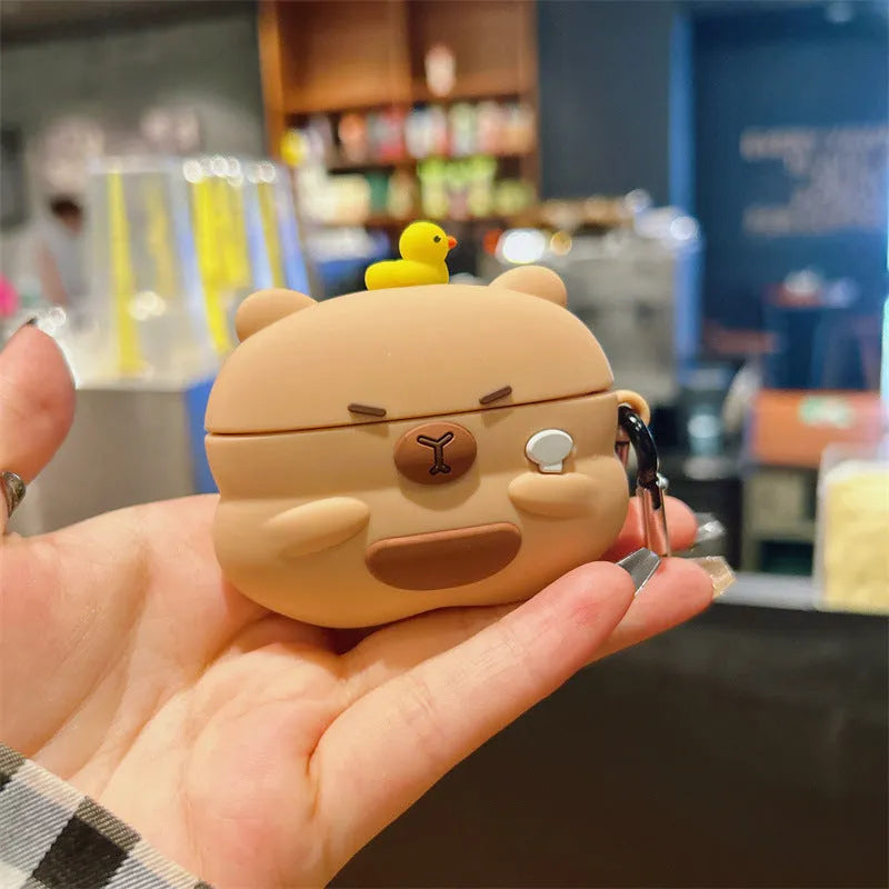 Silicone AirPods cover with overhead duck capybara design in soft shell cartoon style