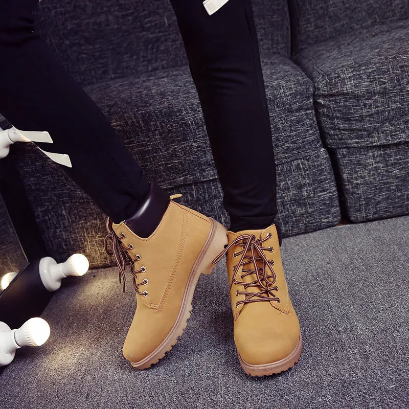 Men's pink Martin boots with velvet lining, round toe design and front lace-up closure