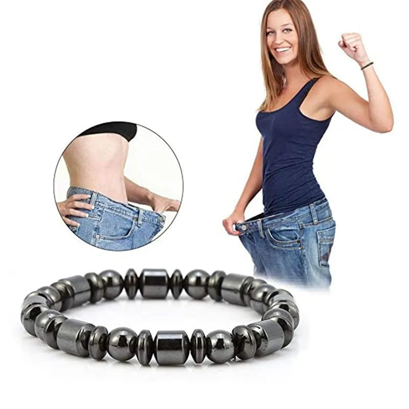 Black pentagram design magnetic therapy bracelet with magnetite and hematite stones on a stretch band.